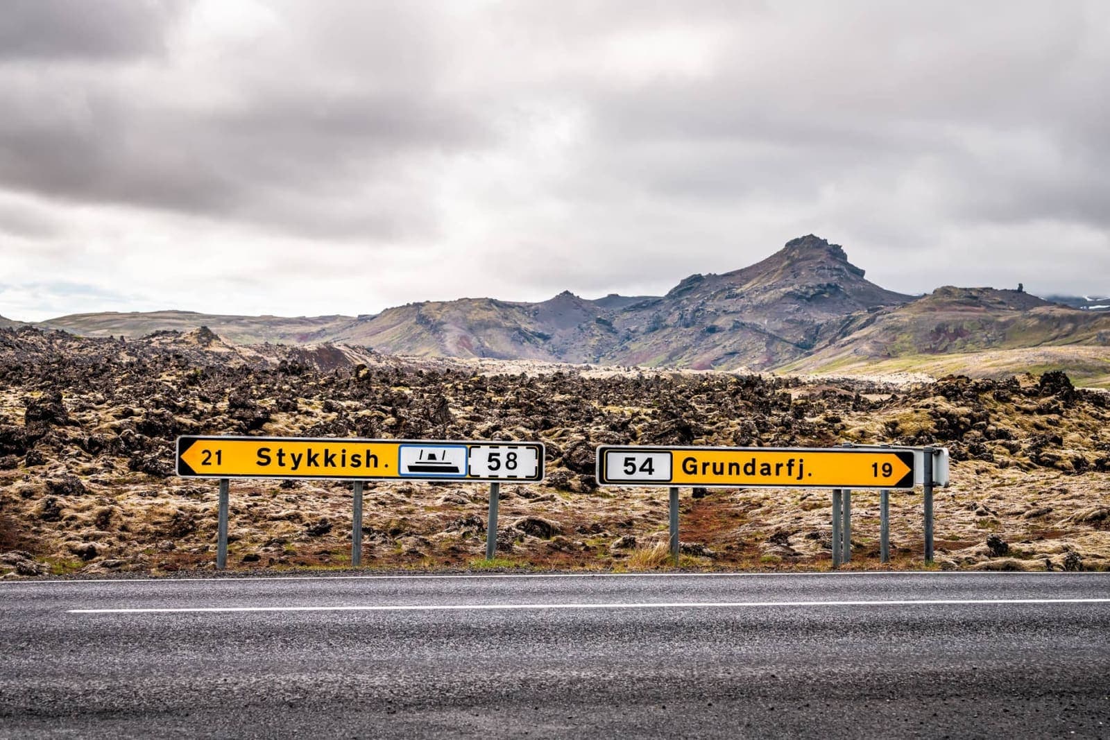 Road signs point toward Stykkishólmur and Grundarfjörður on the Snæfellsnes Peninsula.