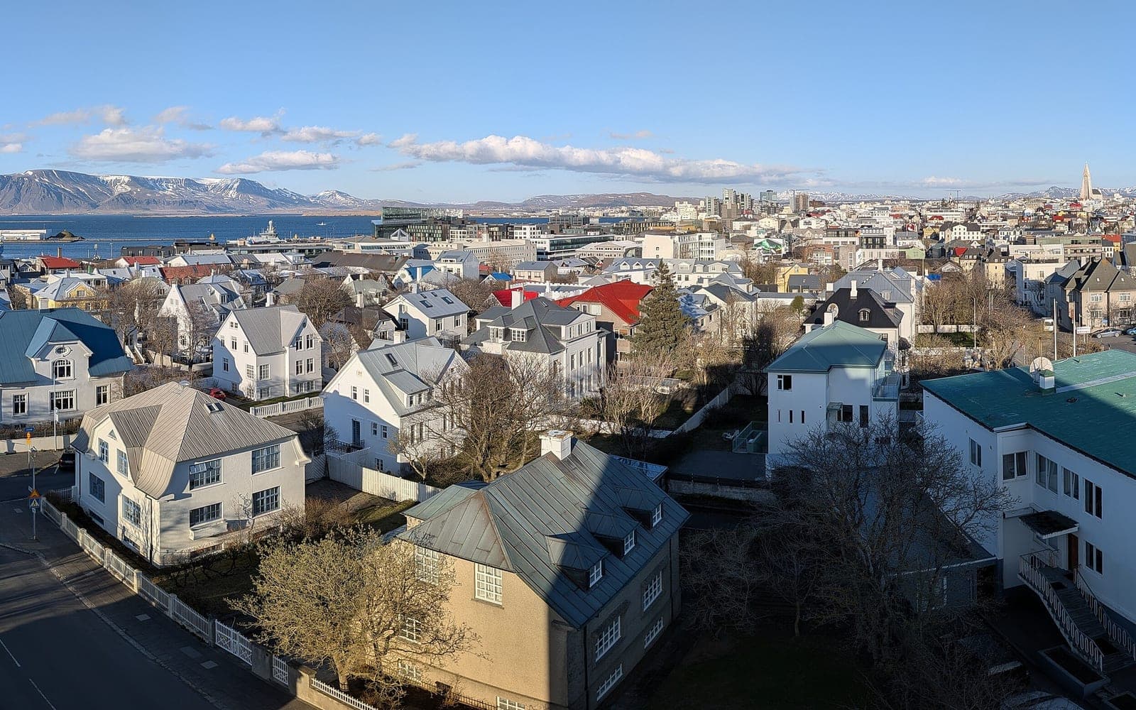 Central Reykjavík rooftops, the harbour and Mount Esja, with Hallgrímskirkja on the skyline